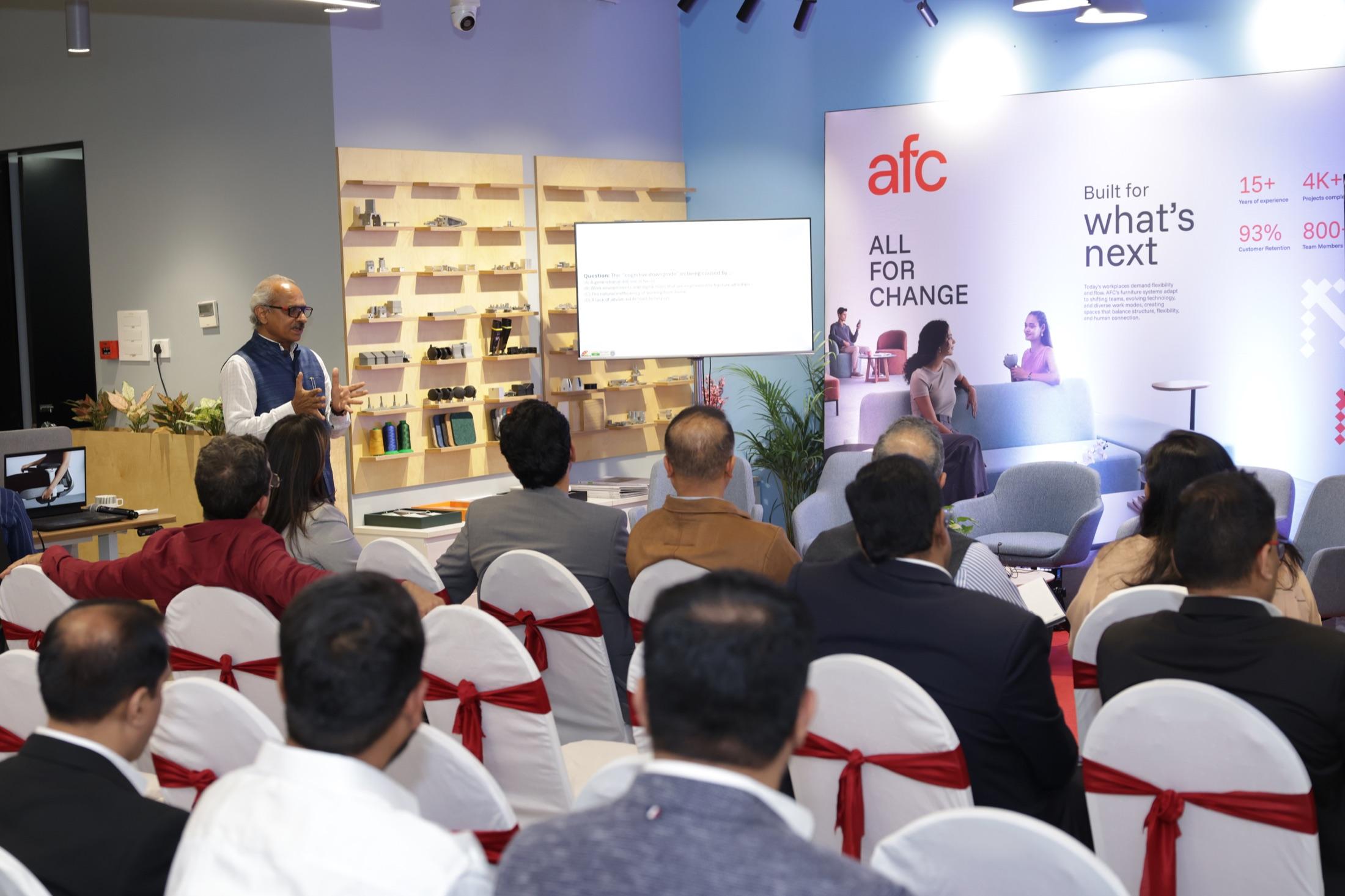 Speaker addressing an audience at a professional gathering